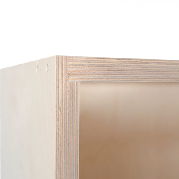 Close-up of a Deelux plywood kitchen cabinet showing solid 18mm back, screwed construction and traditional joinery