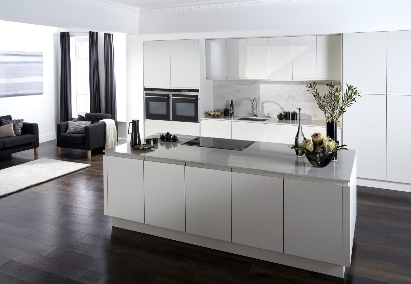 Malmö handleless slab kitchen by Burbidge — paired with Deelux cabinetry