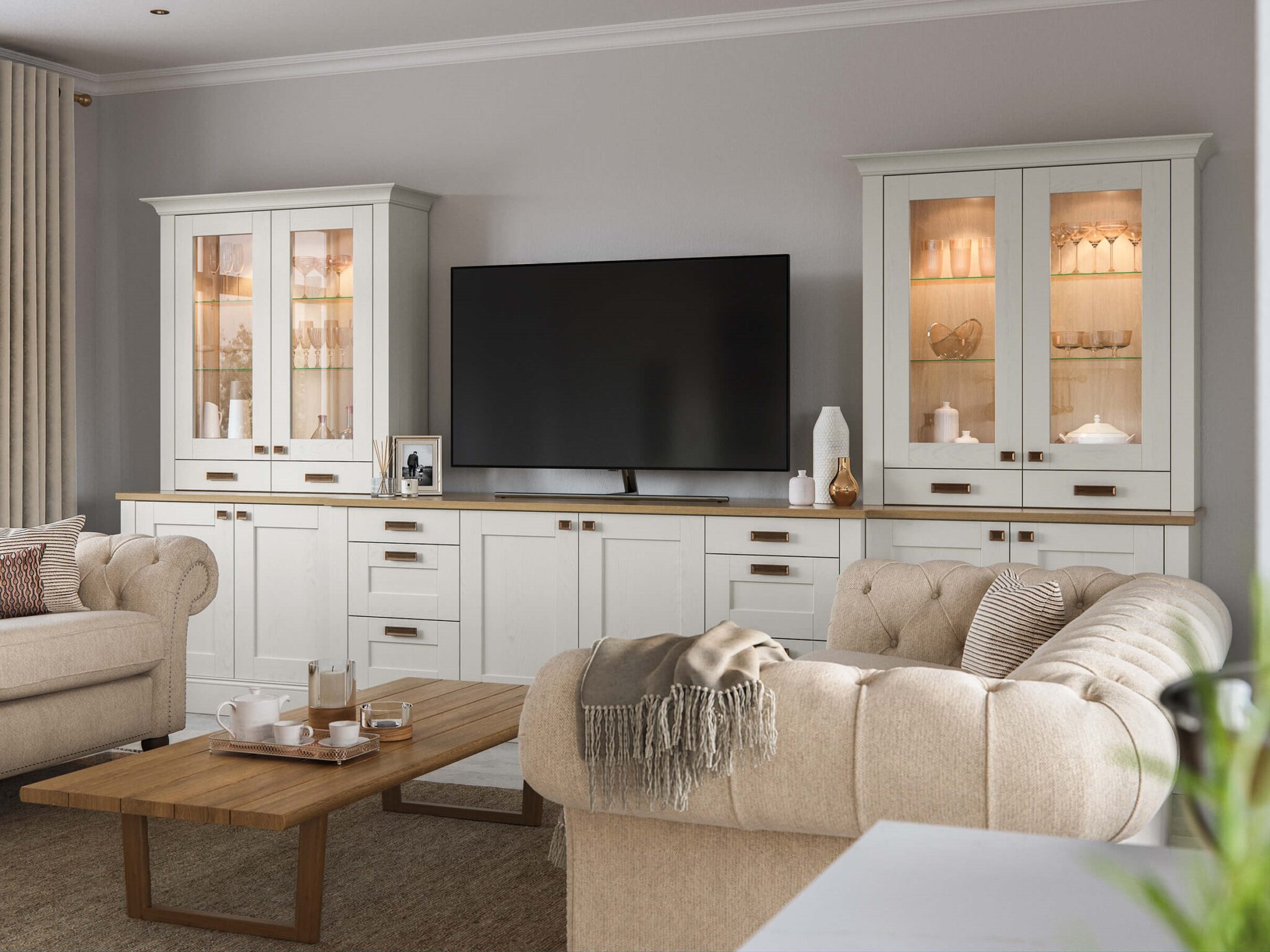 Design visualisation of an ivory painted shaker media wall with internally lit glazed display dressers, oak worktop and bronze cup handles